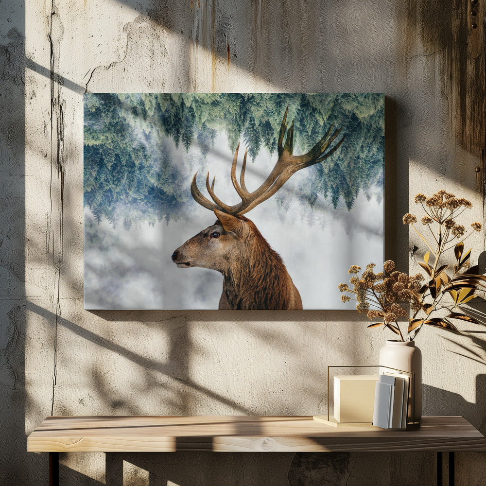 A surreal double-exposure style image featuring the profile of a brown stag with large antlers. The top half of the image is an inverted green pine forest that blends into a foggy, light grey background surrounding the deer. The entire artwork is presented within a silver frame. Poster
