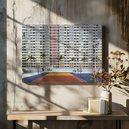 A wide, symmetrical photograph of the colorful Choi Hung Estate apartment building in Hong Kong, featuring a facade with a repeating pattern of pastel blue, green, yellow, and orange blocks. In front of the building is a vibrant basketball court painted in bold sections of blue, red, and yellow, with several palm trees lining the courtyard. Print