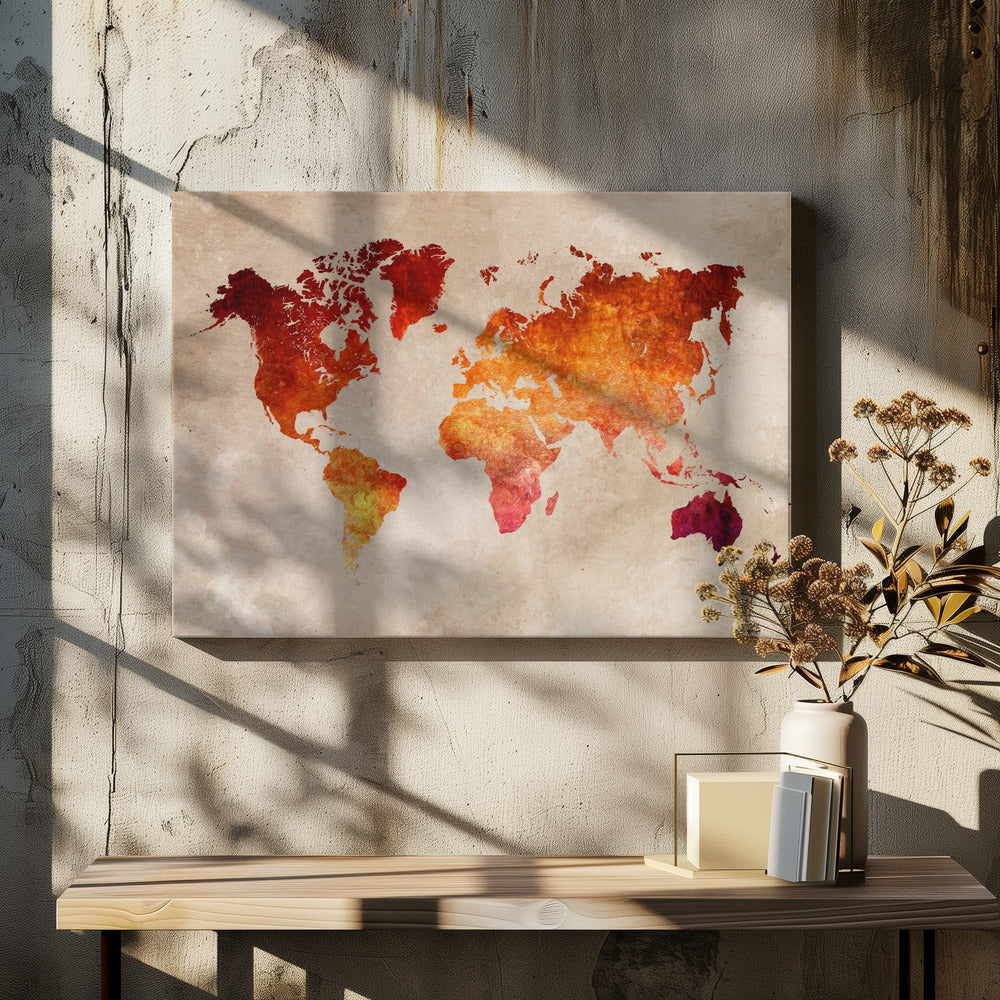 An artistic world map with continents filled in a fiery, textured blend of red, orange, and yellow hues. The map is set against a distressed, parchment-style beige background and is presented in a brushed silver frame. Poster