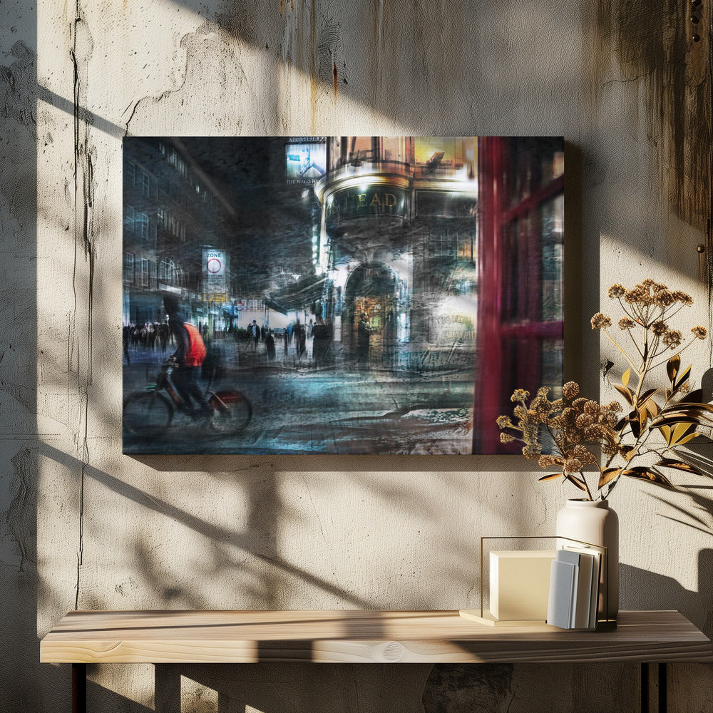 An abstract, moody digital artwork of a bustling London street at night. The scene has a layered, textured look with motion blur, featuring a cyclist in a red vest, the illuminated sign for 'The Nag's Head' pub, and a classic red telephone booth in the foreground, all within a silver frame. Wall Art