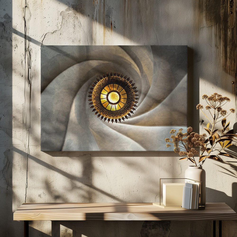 A low-angle, centered photograph looking up at an ornate, golden sunburst chandelier hanging from the vortex of a swirling, textured cream-colored ceiling, enclosed in a silver frame. Poster