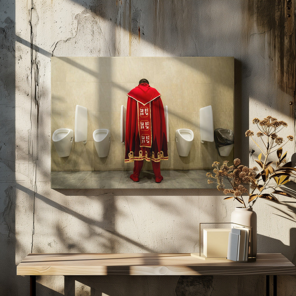 A back view of a person wearing an elaborate, long red and gold cape, standing at a urinal in a modern public restroom with beige tiled walls and multiple white urinals. Artwork