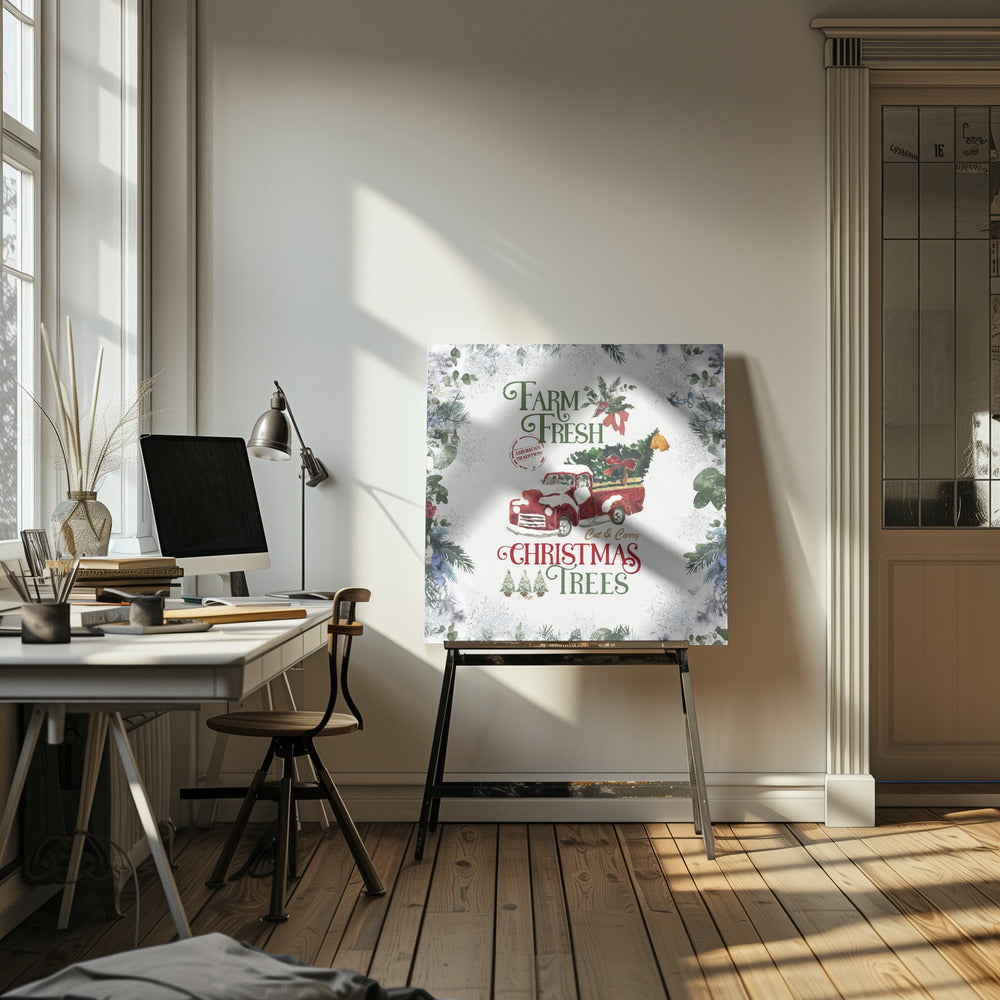 A vintage-style Christmas art print in a light wood frame. It features a watercolor illustration of a classic red pickup truck carrying a Christmas tree, with snow on its hood and roof. The text reads 'Farm Fresh Cut & Carry Christmas Trees' in festive green and red fonts. The background is white with a decorative border of frosted greenery and snowflakes. Wall Art