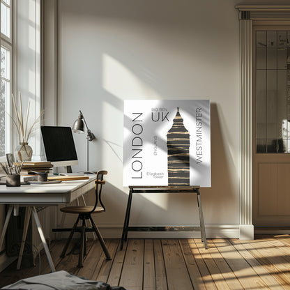 A modern art print in a light wood frame featuring a stylized black and gold silhouette of Big Ben. The image is on a white background with sans-serif text reading 'LONDON' and 'WESTMINSTER' vertically on either side, and 'BIG BEN', 'UK', and 'ENGLAND' centrally. Wall Art