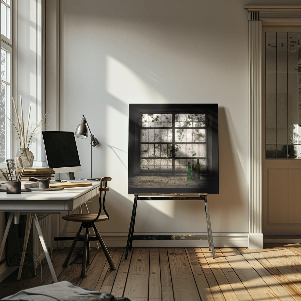 A moody photograph of three dusty green glass bottles sitting on a dirty windowsill in a dark, abandoned room. Behind them, a large, grimy, multi-paned window with wire mesh lets in dim light, revealing the silhouettes of overgrown vines outside. Poster