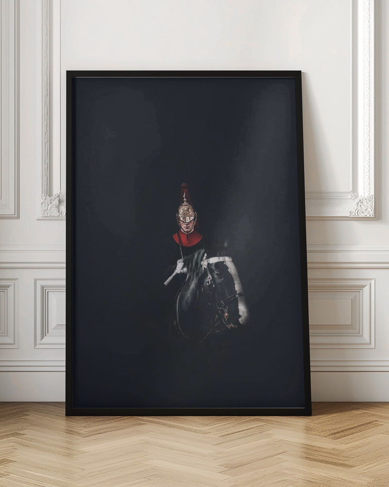 A dramatic portrait of a British Royal Guard on a black horse, emerging from a completely black background. The guard is wearing a traditional uniform with a red collar and a shiny gold helmet with a red plume. Poster