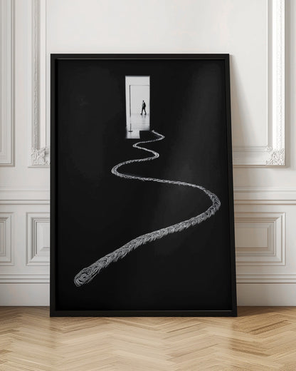 A high-contrast, black and white photograph of a thick, silver, braided rope winding across a black floor, leading towards a brightly lit doorway in the distance where a silhouetted man is walking away. Wall Art
