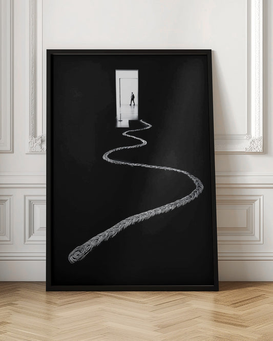 A high-contrast, black and white photograph of a thick, silver, braided rope winding across a black floor, leading towards a brightly lit doorway in the distance where a silhouetted man is walking away. Wall Art