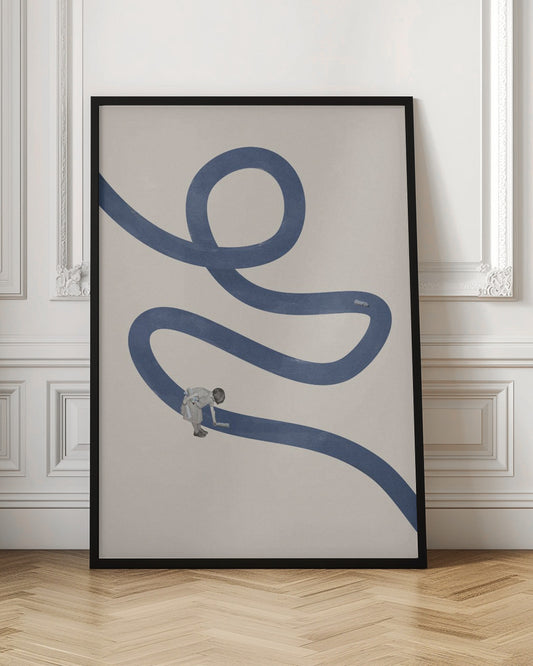 A minimalist collage artwork featuring a thick, winding blue path on a textured beige background. In the lower half, a small child is shown leaning over and appearing to paint the blue path with a roller, creating a surreal and imaginative scene. The artwork is presented in a thin black frame. Decor