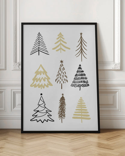 A minimalist art print featuring a grid of nine hand-drawn Christmas trees against a white background. The trees are depicted in various simple, stylized forms using black, gold, and brown colors. The entire piece is shown within a thin black frame. Artwork