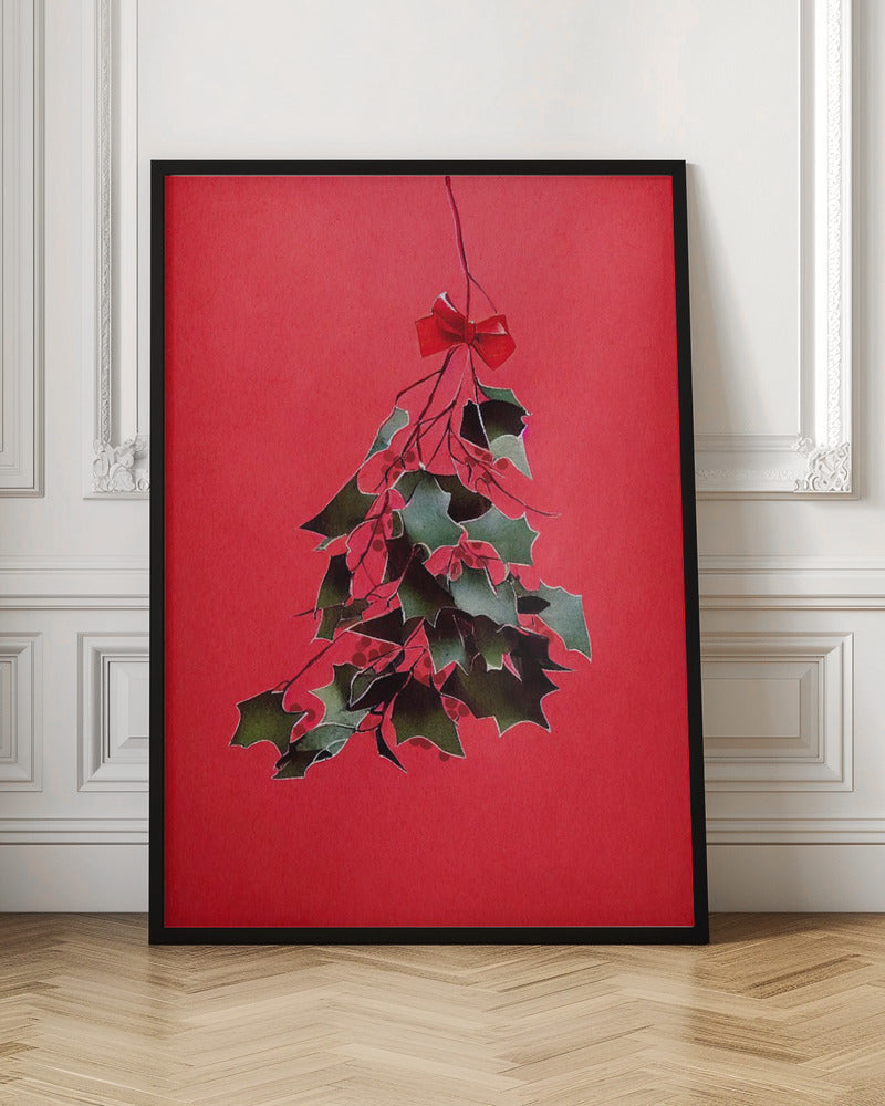 A festive illustration of a bunch of green holly with red berries hanging upside down, tied with a small red bow. The artwork is set against a solid, bright red background and enclosed in a thin black frame. Print