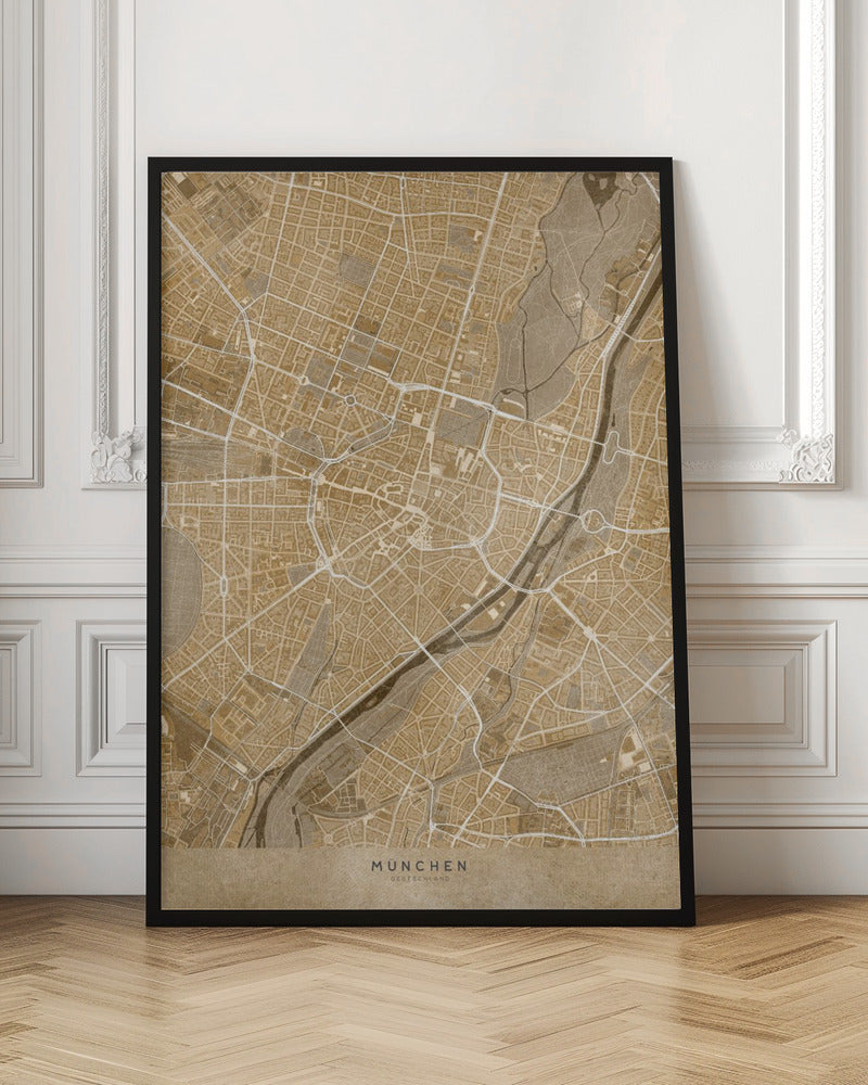 A vintage-style map of Munich, Germany, displayed in a black frame. The map is rendered in shades of brown and beige, with roads and rivers highlighted in white, creating a detailed and artistic representation of the city's layout. At the bottom, the words 'MÜNCHEN' and 'DEUTSCHLAND' are printed. Poster