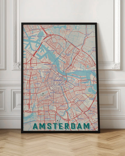 A stylized, retro-style map of Amsterdam, Netherlands, displayed within a black frame. The map features a network of red roads, light blue canals and waterways, on a cream-colored background, with the word 'AMSTERDAM' in large, dark teal letters at the bottom. Wall Art