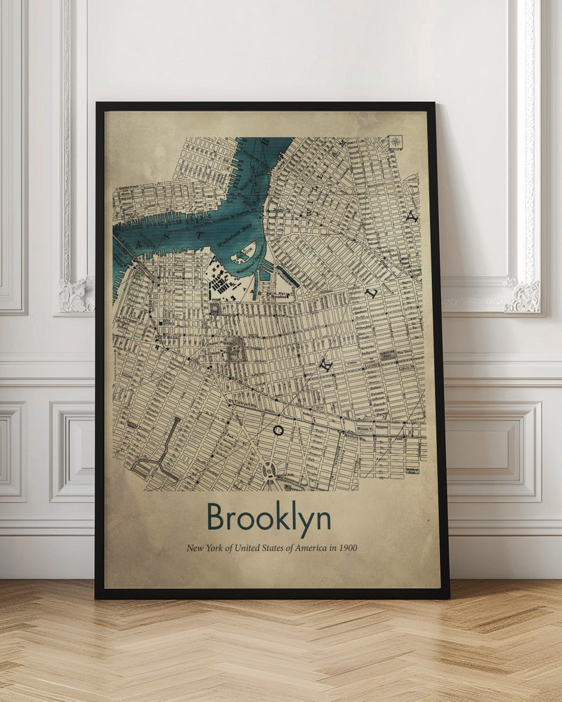 A framed vintage map poster of Brooklyn, New York from the year 1900. The map details the city's grid-like streets on an aged, beige paper background, with the waterways, including Wallabout Bay, highlighted in a vibrant teal color. The poster is titled "Brooklyn" in a dark green font at the bottom. Decor