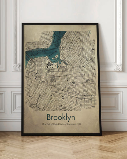 A framed vintage map poster of Brooklyn, New York from the year 1900. The map details the city's grid-like streets on an aged, beige paper background, with the waterways, including Wallabout Bay, highlighted in a vibrant teal color. The poster is titled "Brooklyn" in a dark green font at the bottom. Decor
