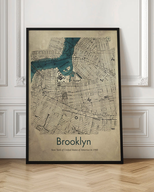 A framed vintage map poster of Brooklyn, New York from the year 1900. The map details the city's grid-like streets on an aged, beige paper background, with the waterways, including Wallabout Bay, highlighted in a vibrant teal color. The poster is titled "Brooklyn" in a dark green font at the bottom. Decor