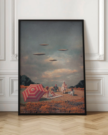 A surreal vintage collage showing a family having a picnic in a field of orange flowers under a cloudy sky, while four flying saucers hover peacefully above them. Print