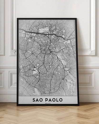 A minimalist black and white map of Sao Paolo, showcasing the intricate network of city streets and highways. The poster is enclosed in a simple black frame and features the city's name 'SAO PAOLO' in bold capital letters at the bottom. Artwork
