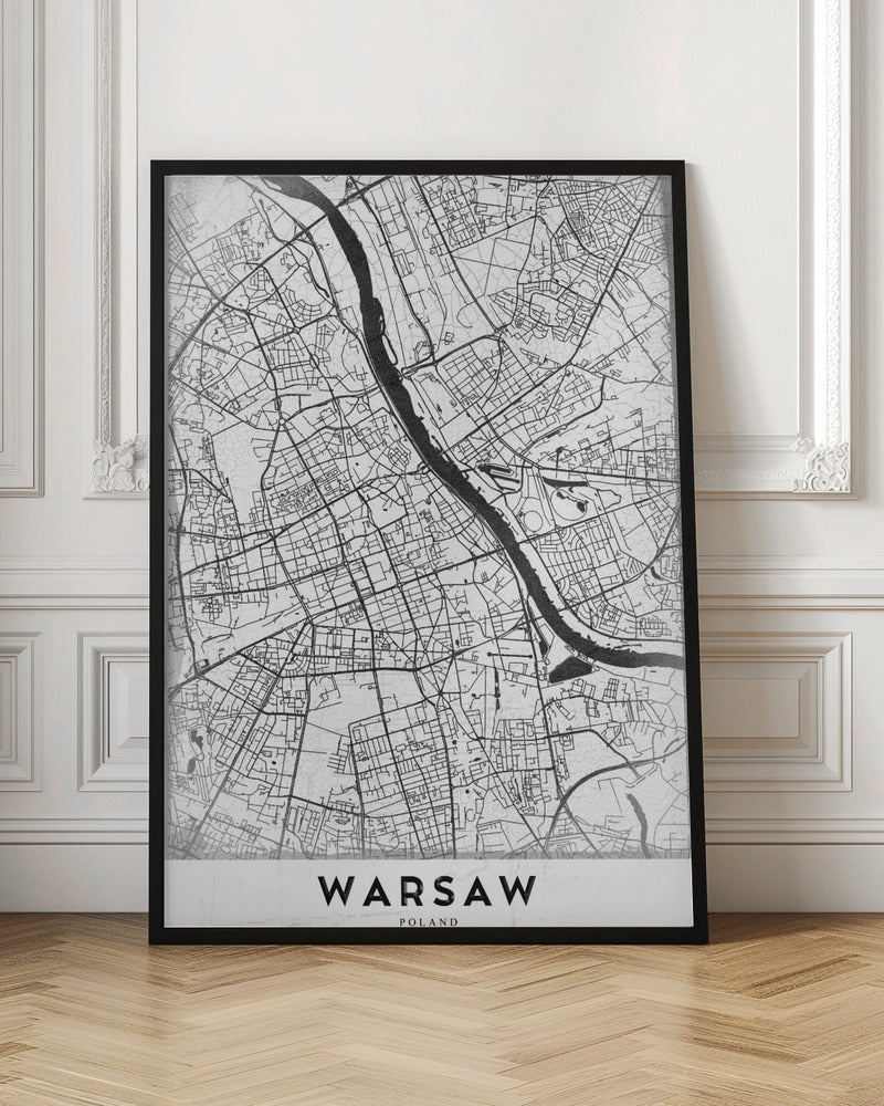 A minimalist black and white street map of Warsaw, Poland, displayed in a black frame. The map details the intricate network of roads and the Vistula River, with the city's name 'WARSAW' printed in a bold, black, sans-serif font at the bottom. Print