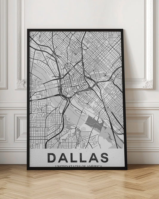 A modern, minimalist black and white map of Dallas, Texas, framed in black. The map shows a detailed network of roads, highways, and a river, with the city name 'DALLAS' in large, bold letters at the bottom. Wall Art