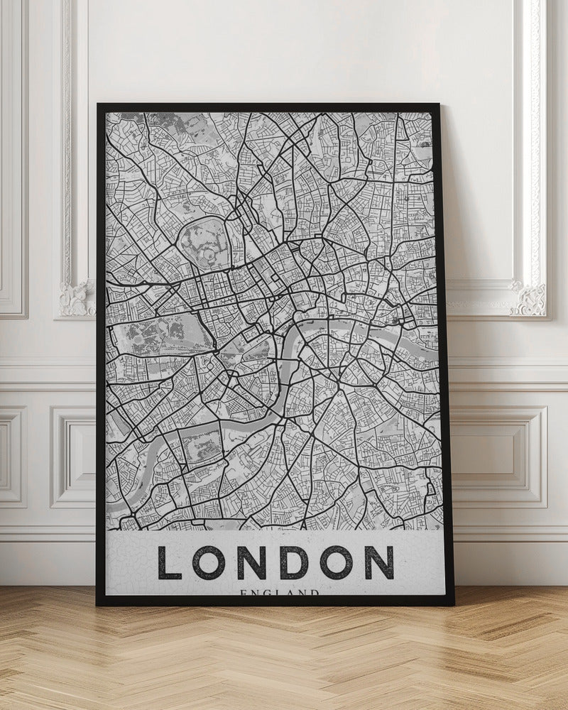 A minimalist black and white map of London, showcasing its intricate street layout, the River Thames, and various parks. The map is set within a simple black frame, and the word 'LONDON' is printed in a bold, black, sans-serif font on a white banner at the bottom. Artwork