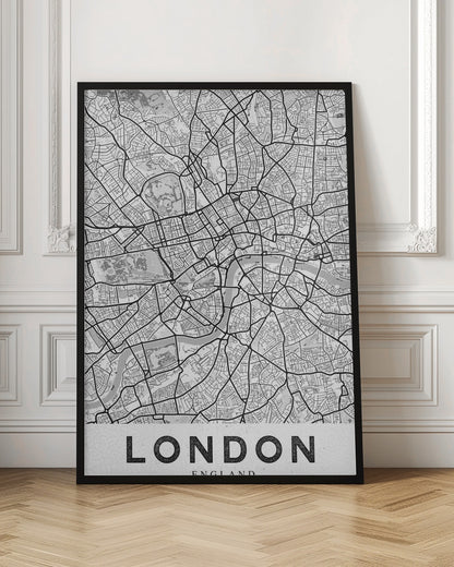 A minimalist black and white map of London, showcasing its intricate street layout, the River Thames, and various parks. The map is set within a simple black frame, and the word 'LONDON' is printed in a bold, black, sans-serif font on a white banner at the bottom. Artwork