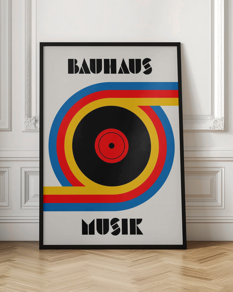 A Bauhaus style poster with the word 'BAUHAUS' at the top and 'MUSIK' at the bottom in a black geometric font. The central image is a stylized vinyl record made of bold blue, red, and yellow stripes against an off-white background, all enclosed in a thin black frame. Print