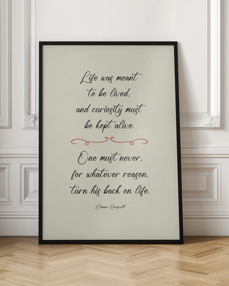 A framed inspirational quote by Eleanor Roosevelt in a black cursive font on a textured beige background. The quote reads: 'Life was meant to be lived, and curiosity must be kept alive. One must never, for whatever reason, turn his back on life.' A red decorative flourish separates the two stanzas. Decor