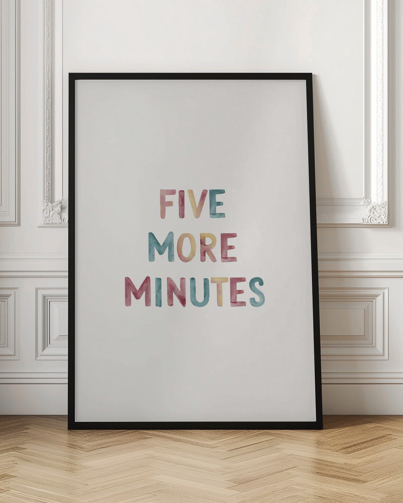 A framed art print with the text 'FIVE MORE MINUTES' in a colorful watercolor style against a white background. The words are arranged vertically, and the print is housed in a simple black frame. Wall Art