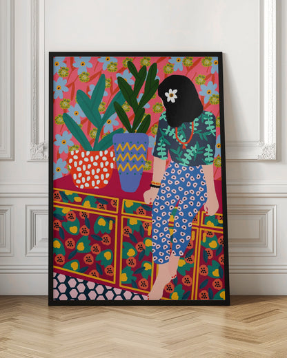 A colorful, maximalist illustration of a woman with black hair and a flower, sitting on a patterned cabinet. She wears a dark blue shirt with green leaves and blue pants with white circles. Next to her are two potted plants in brightly patterned pots, set against a pink and blue floral wallpaper. Poster