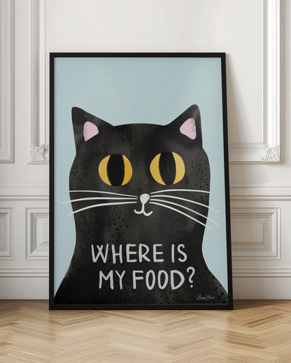 A humorous art print of a black cat with large, expressive yellow eyes looking forward against a light blue background. Below the cat's face, the phrase 'WHERE IS MY FOOD?' is written in a white, uppercase, handwritten-style font. Wall Art