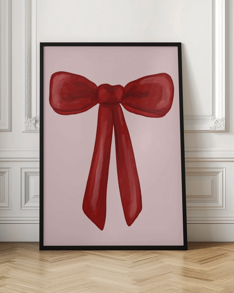 A digital painting of a large, shiny red ribbon tied into a bow, centered against a solid light pink background. The artwork is shown within a thin black frame. Print