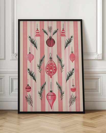 A framed art print with a festive pattern of various red and pink Christmas ornaments and pine sprigs. The background features vertical stripes in shades of pink and off-white, creating a cheerful, retro holiday aesthetic. Poster