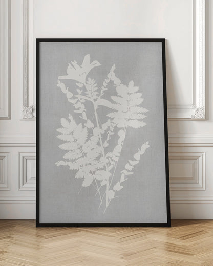 A framed artwork featuring a white silhouette of a botanical arrangement with ferns, flowers, and leaves against a textured light grey background. Decor