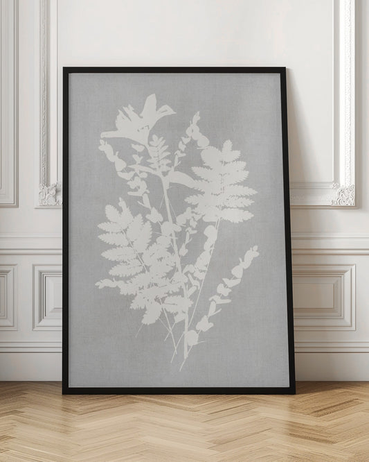 A framed artwork featuring a white silhouette of a botanical arrangement with ferns, flowers, and leaves against a textured light grey background. Decor