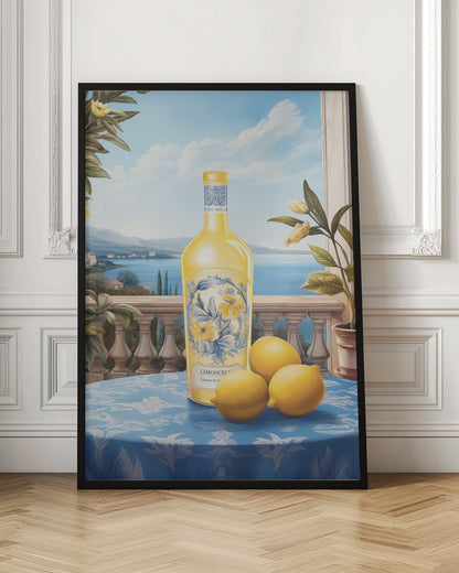 A vintage-style painting of a bottle of limoncello and three fresh lemons on a blue patterned tablecloth. The scene is set on a balcony with a stone balustrade, overlooking a serene blue sea and a picturesque coastal town under a bright sky. Poster