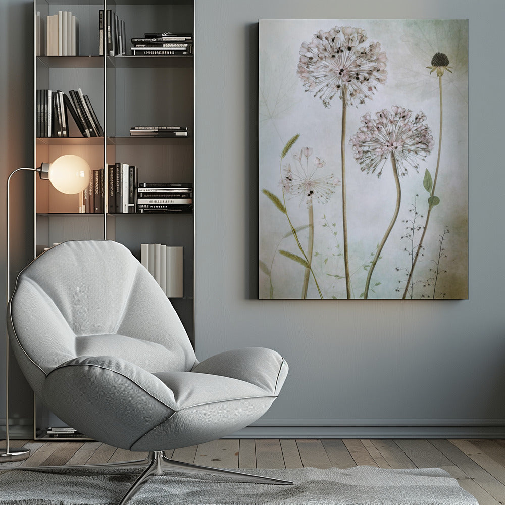 A framed botanical artwork featuring a variety of delicate wildflowers, including several large, round, light pink allium heads with dark centers, on long slender stems against a pale, textured green and beige background. Decor