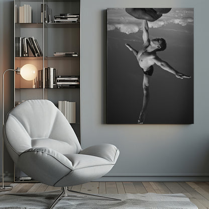 A surreal black and white photograph of two male acrobats. One man, in a graceful dance-like pose balancing on one leg, holds another man aloft with a single outstretched arm. The man being held is upside down against a backdrop of clouds, creating a gravity-defying and artistic illusion. Print