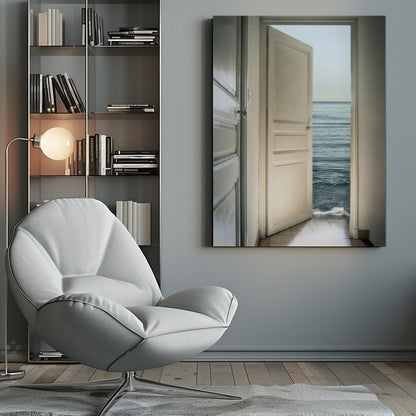 A surreal photograph showing a white interior door swung open, revealing not a landscape but the vast blue ocean, with waves gently washing over the tiled floor of the room. Decor
