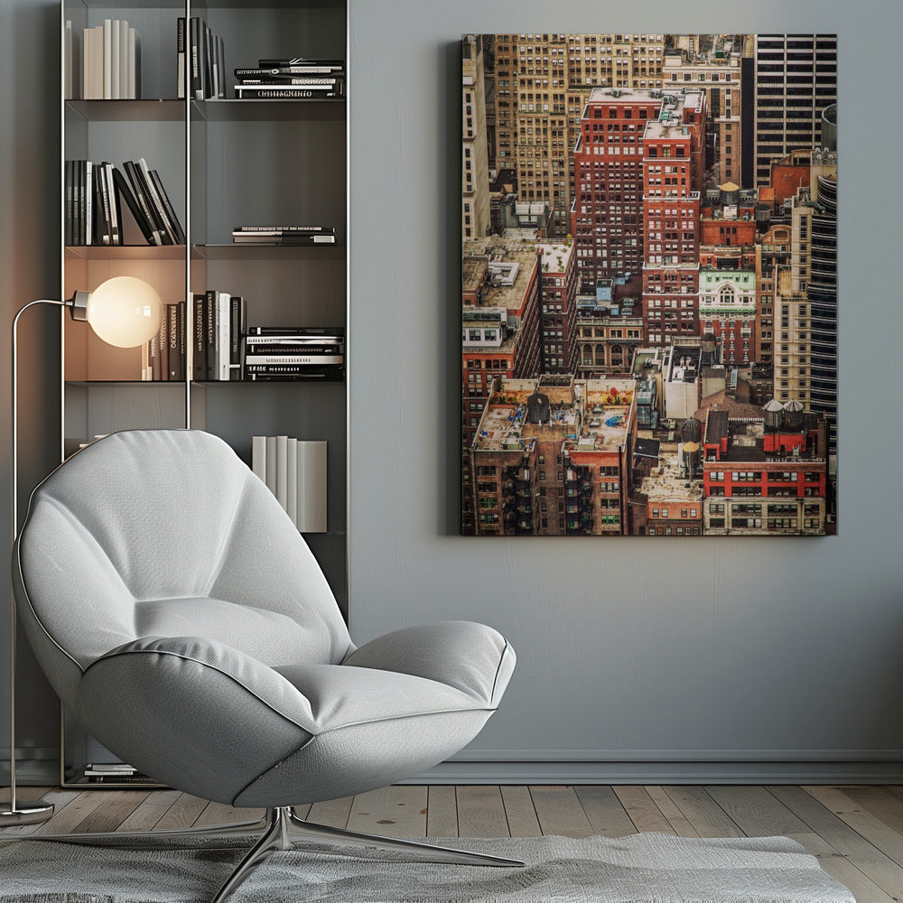 A high-angle, telephoto view of a dense cluster of New York City buildings, featuring a mix of red and brown brick architecture, with numerous windows creating a geometric pattern and several classic wooden water towers perched on the rooftops. Print