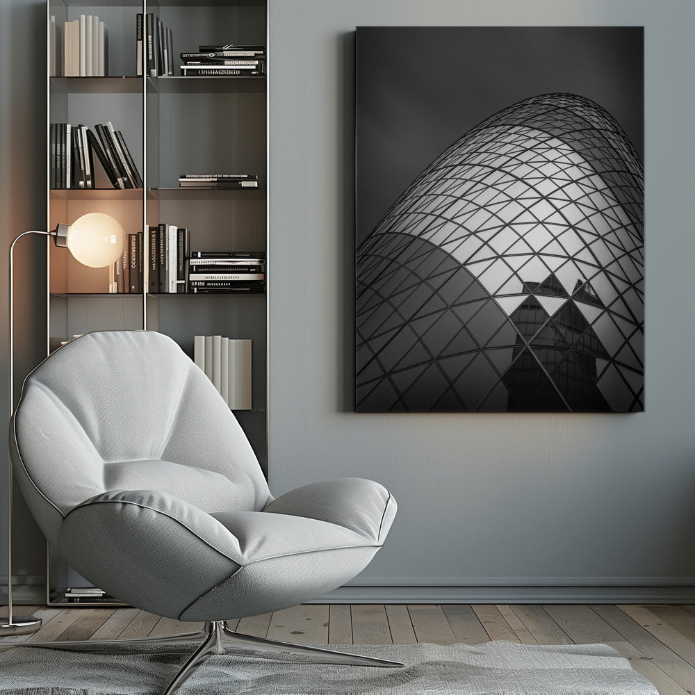 A framed, low-angle, black and white photograph of the curved, glass-paneled facade of a modern skyscraper, creating a dynamic pattern of reflective diamonds against a dark, moody sky. Artwork