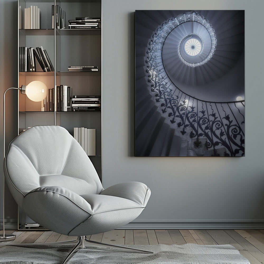 A dramatic low-angle view looking up a majestic spiral staircase, its ornate black wrought iron railings creating a dark, intricate pattern against the cool-toned white steps that wind towards a circular skylight at the apex. Decor