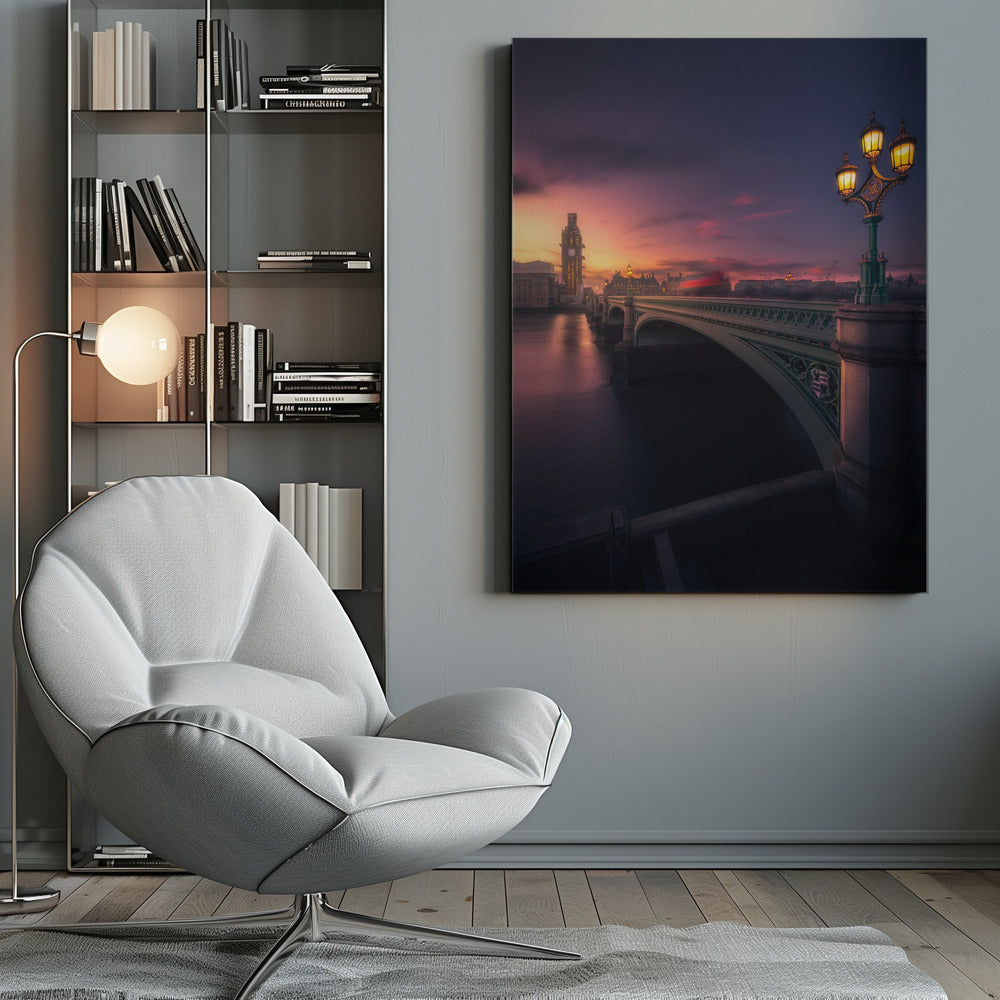 A breathtaking twilight view of Westminster Bridge in London, with the iconic Big Ben illuminated in the background against a purple and orange sunset sky. A vintage street lamp glows warmly in the foreground, and the motion blur of a red bus crosses the bridge over the calm River Thames. Print