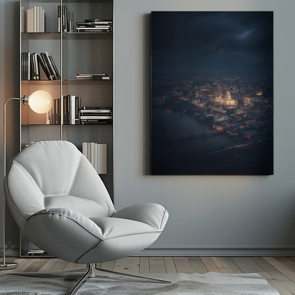 An atmospheric aerial view of London at night, with the illuminated St. Paul's Cathedral as the central focus. The sprawling cityscape glows with warm lights against a dark, stormy sky, while the River Thames flows in the foreground. Wall Art
