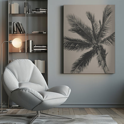 A low-angle, monochrome photograph of a palm tree against a solid light beige sky. The image is framed in black, and the palm fronds spread out across the frame, with a few coconuts visible at the top of the trunk. Poster