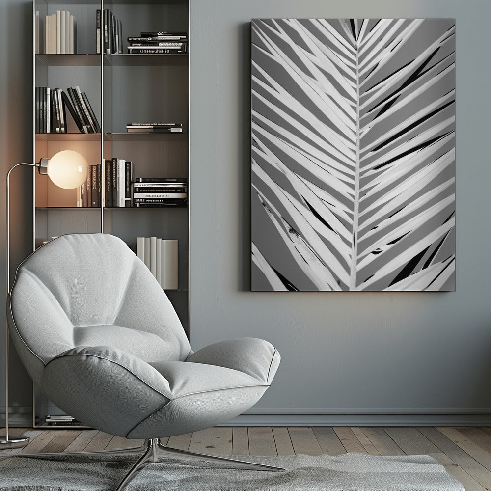 A high-contrast, black and white close-up photograph of a palm frond. The central stem runs vertically through the frame, with the individual leaves creating a dynamic pattern of diagonal white and gray stripes, accented by deep black shadows. The entire image is presented within a thin black frame. Print