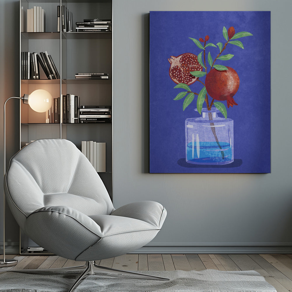 A vibrant illustration of a pomegranate branch in a clear glass vase against a deep blue, textured background. The branch features bright green leaves, a whole red pomegranate, and another cut in half to show its seeds. Decor