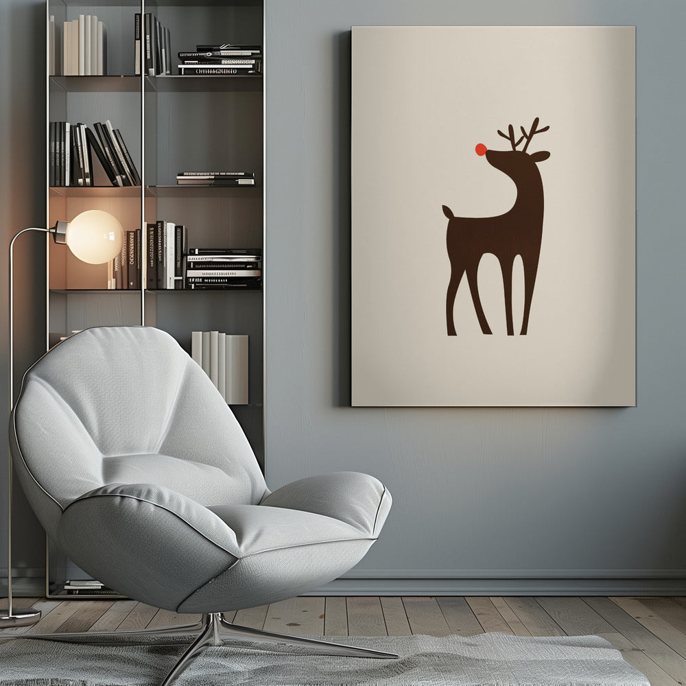 A minimalist art print of a stylized brown reindeer with a bright red nose, standing in profile against a cream-colored background, all enclosed in a simple black frame. Print
