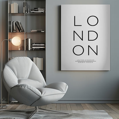A minimalist black and white typographic poster featuring the word 'LONDON' arranged vertically in a modern sans-serif font. Below the city name, it displays 'UNITED KINGDOM' and its geographic coordinates, all enclosed within a thin black frame. Poster