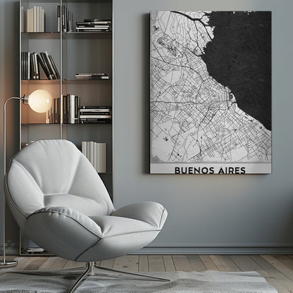 A minimalist black and white map of Buenos Aires, presented as a poster in a black frame. The city's roads and geography are detailed in black lines on a white background, while the adjacent body of water is solid black. The text 'BUENOS AIRES' is displayed at the bottom. Wall Art